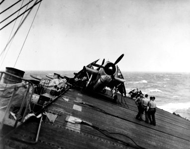 USS Anzio (CVE-57) rolling heavily during Typhoon Cobra, 17 December 1944 (80-G-298079)