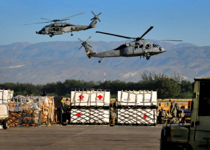 US Navy 100118-N-4774B-006 U.S. Navy SH-60F Sea Hawk helicopters from the Nimitz-class aircraft carrier USS Carl Vinson (CVN 70) transport water and supplies from the airport to areas around Port-au-Prince