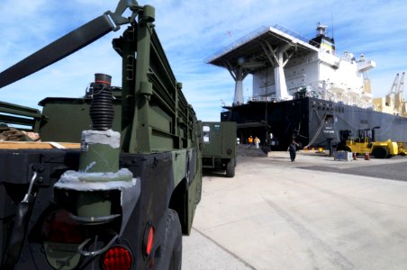 US Navy 100118-N-1522S-500 The Military Sealift Command maritime prepositioning ship USNS 1st Lt. Jack Lummus (T-AK-3011) receives cargo from the U.S. Agency for International Development (USAID