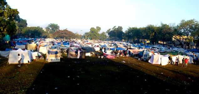 US Navy 100119-N-6266K-017 Hundreds of displaced Haitians live in make-shift homes outside Gheskio Field Hospital in Haiti