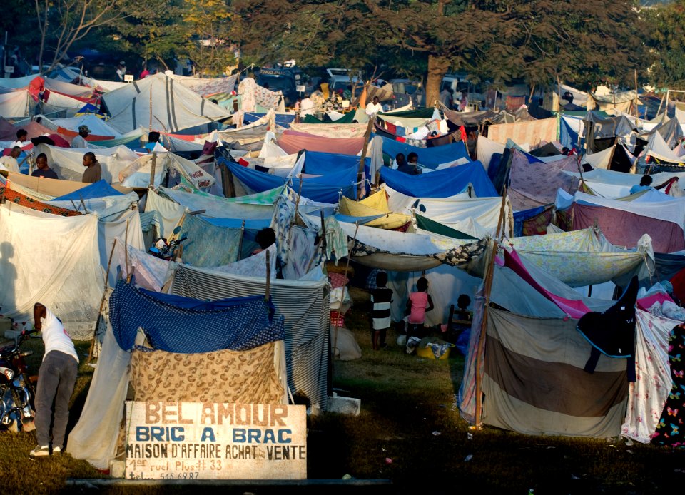 US Navy 100119-N-6266K-020 Hundreds of displaced Haitians live in make-shift homes outside Gheskio Field Hospital in Haiti