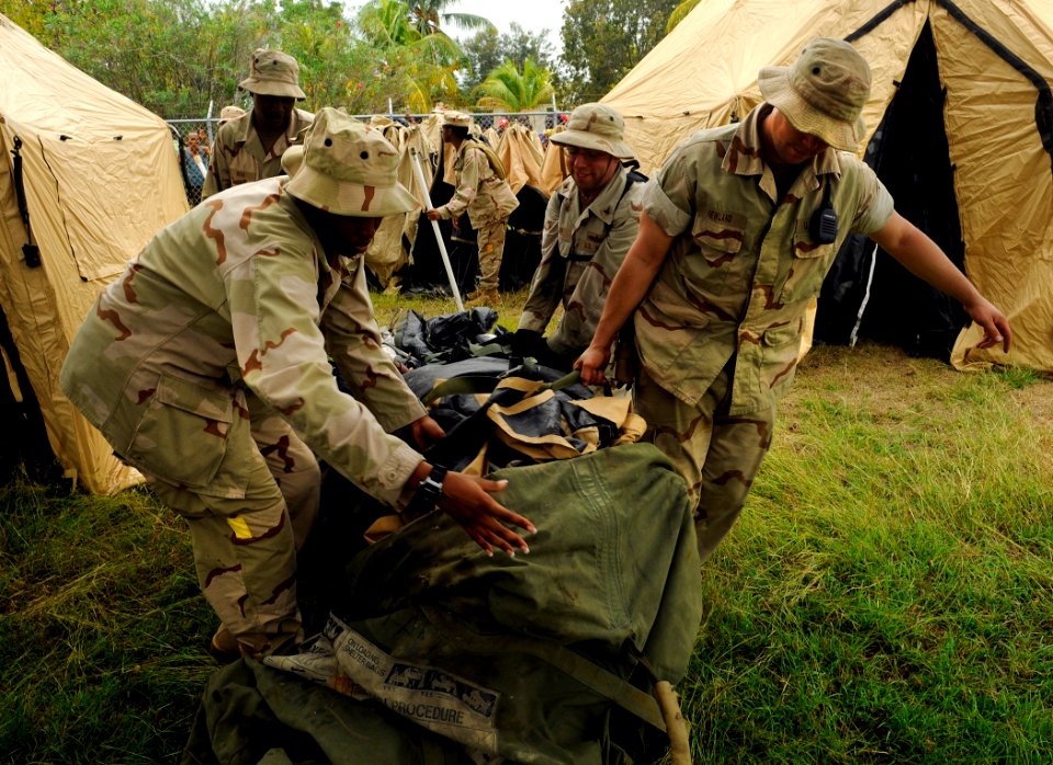 US Navy 100119-N-5345W-146 Sailors assigned to Beach Master Unit (BMU) 2, part of the Bataan Amphibious Relief Mission, establish an operating base at New Hope Mission in Bonel, Haiti for U.S. Navy and Marine Corps humanitarian