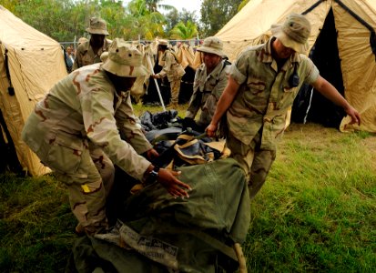 US Navy 100119-N-5345W-146 Sailors assigned to Beach Master Unit (BMU) 2, part of the Bataan Amphibious Relief Mission, establish an operating base at New Hope Mission in Bonel, Haiti for U.S. Navy and Marine Corps humanitarian