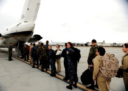 US Navy 100118-N-7032B-106 Medical staff board an aircraft at Naval Air Station North Island to go to Haiti in support of Operation Unified Response