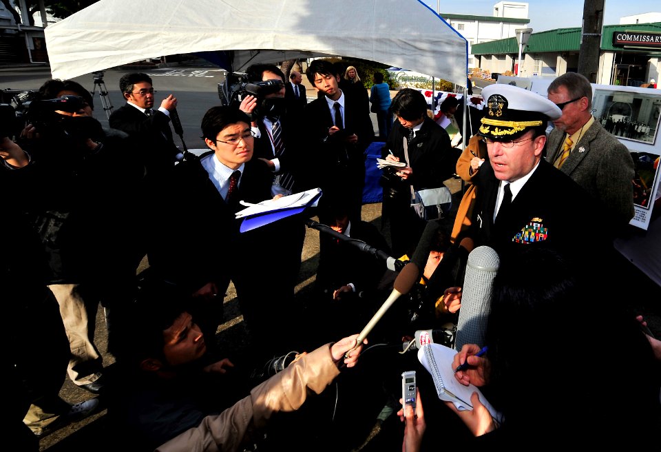 US Navy 100119-N-0807W-158 Capt. Francis X. Martin, commander of Fleet Activities Sasebo, speaks with Japanese media at a ceremony celebrating the 50th anniversary of the signing of the Treaty of Mutual Cooperation and Security