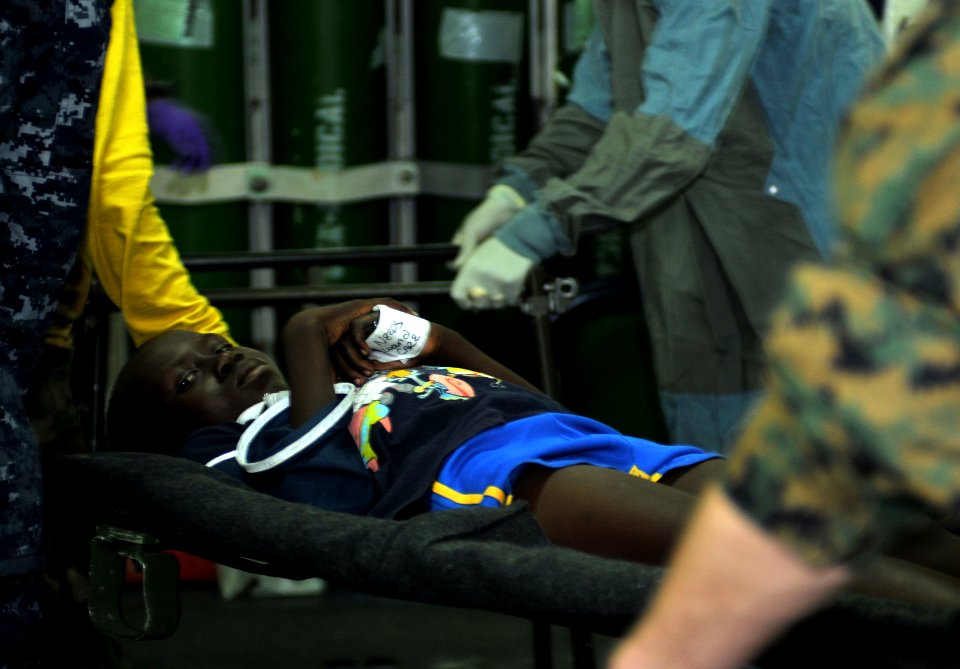 US Navy 100120-N-1831S-071 Medical staff aboard USS Bataan (LHD 5) treat an injured patient during a mass causality environment