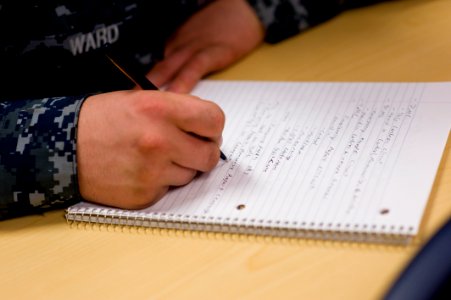 US Navy 100119-N-7090S-094 A Sailor takes notes during a class at the Basic Enlisted Submarine School at Naval Submarine Base New London, Conn photo