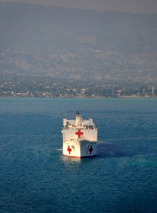 US Navy 100120-N-4774B-081 The Military Sealift Command hospital ship USNS Comfort (T-AH 20) is seen off the coast of Haiti photo