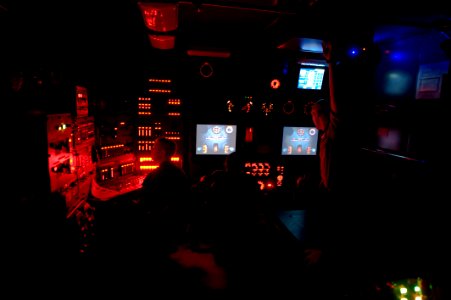US Navy 100120-N-7090S-208 Students learn basic submarine controls while participating in the Basic Ships Control Cab photo