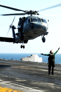 US Navy 100123-N-3038W-312 SH-60F Sea Hawk helicopter lands aboard USS Nimitz