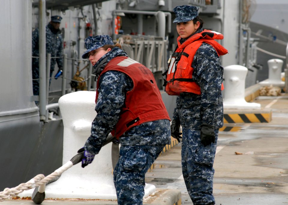 US Navy 100121-N-5087R-074 Sailors work a line of the guided-missile cruiser USS San Jacinto (CG 56)