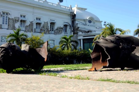 US Navy 100121-N-6410J-369 A statue at the Haitian presidential palace lays in pieces after the Caribbean nation sustained a 7.0 earthquake on Jan. 12, 2010 tha photo