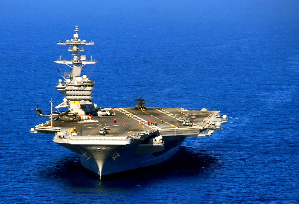 US Navy 100123-N-4774B-005 The Nimitz-class aircraft carrier USS Carl Vinson (CVN 70) maneuvers off the coast of Haiti