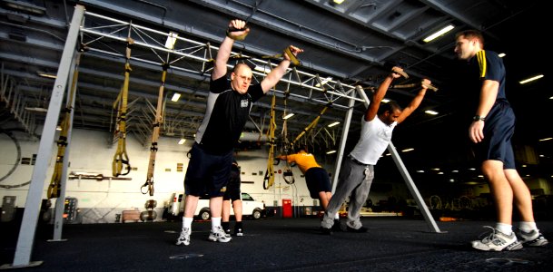 US Navy 100122-N-2475A-087 USS John C. Stennis fitness coordinator conducts exercise training