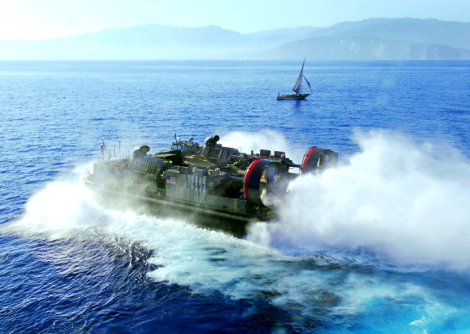 US Navy 100122-N-5214S-027 A landing craft air cushion exits the well deck of USS Bataan (LHD 5)