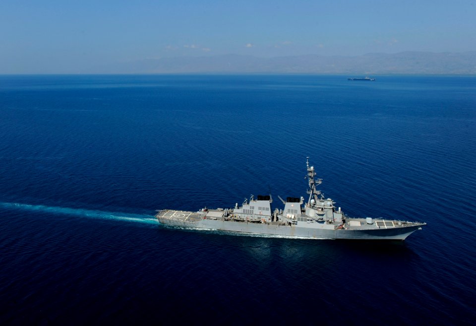 US Navy 100122-N-5345W-135 The guided missile destroyer USS Higgins (DDG 76) transits off the Haiti coast while participating in Operation Unified Response