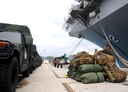 US Navy 100122-N-9950J-232 Marine prepares equipment for on load to USS Essex