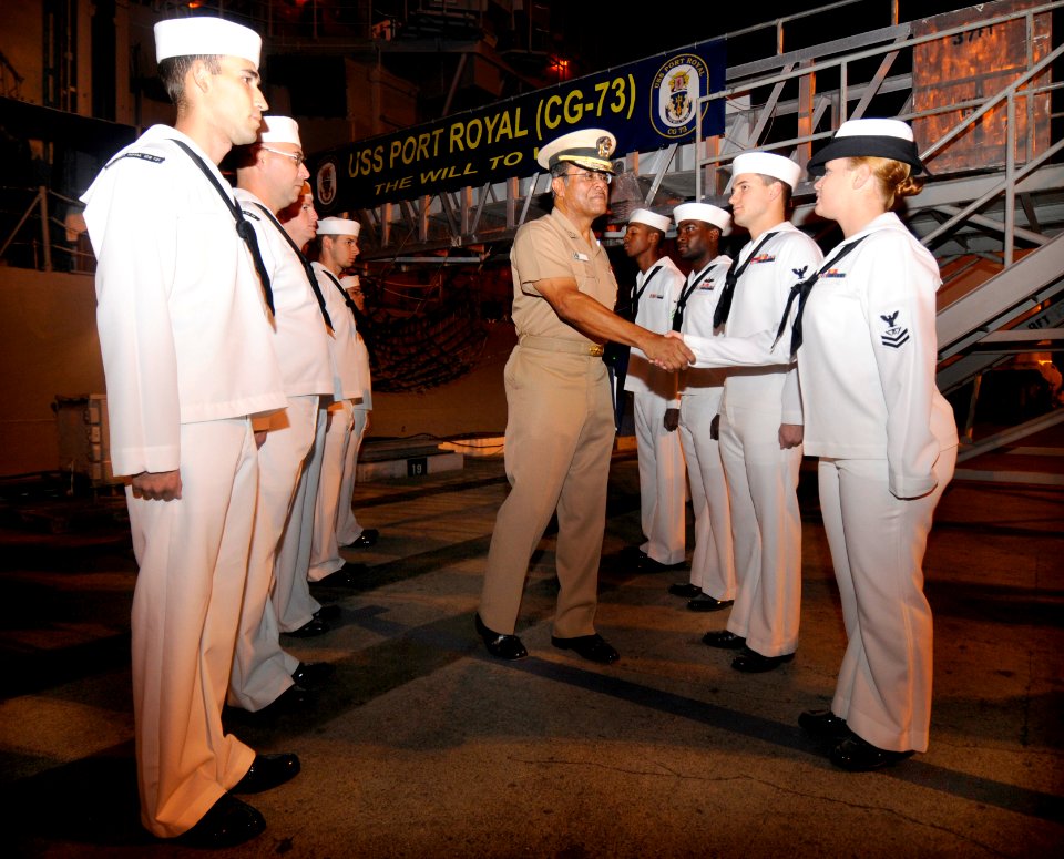 US Navy 100121-N-7498L-084 Vice Adm. D.C. Curtis, commander of Naval Surface Forces, passes through the side boys at the guided-missile cruiser USS Port Royal (CG 73)