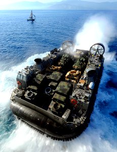 US Navy 100122-N-5345W-003 A landing craft air cushion exits the well deck of USS Bataan (LHD 5)