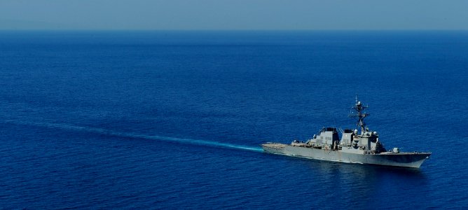 US Navy 100122-N-5345W-098 The guided-missile destroyer USS Higgins (DDG 76) transits off the Haiti coast while participating in Operation Unified Response