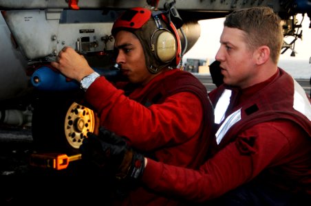 US Navy 100123-N-3038W-087 Aviation Ordnanceman Airman Barrientos and Aviation Ordnanceman 2nd Class Shane Burke