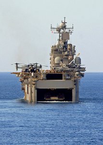 US Navy 100125-N-1082Z-052 he multi-purpose amphibious assault ship USS Nassau (LHA 4) receives a landing craft air cushion (LCAC) photo