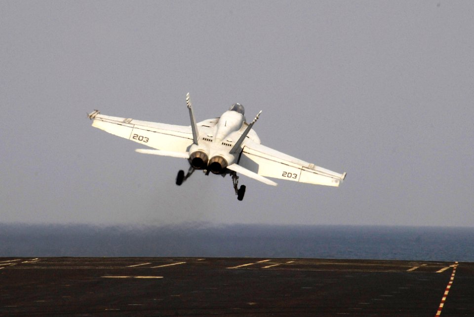 US Navy 100125-N-3327M-153 An F-A-18E Super Hornet assigned to the Tophatters of Strike Fighter Squadron (VFA) 14 launches from the aircraft carrier USS Nimitz (CVN 68)