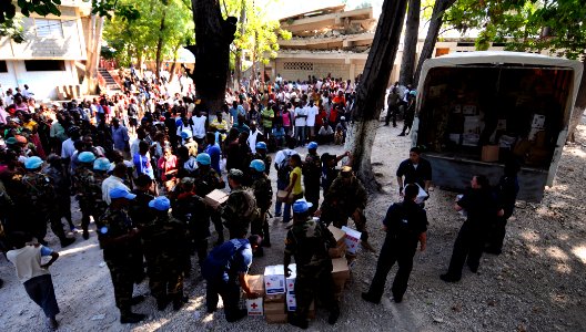 US Navy 100124-N-7948C-069 Maritime Civil Affairs Team 203, along with Sailors from USS Gunston Hall (LSD 44) and ARM Huesteco (AMP 01) deliver donated goods from Mexico