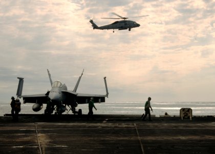 US Navy 100125-N-2858S-204 ATLANTIC OCEAN (Jan. 25, 2009) A SH-60F Sea Hawk helicopter assigned to the Dusty Dogs of Helicopter Anti-Submarine Squadron (HS) 7 prepares to land on the flight deck of the Nimitz-class aircraft car
