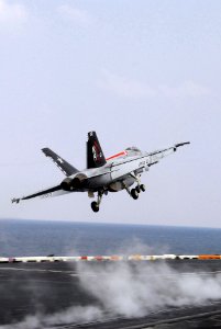 US Navy 100125-N-3327M-164 An F-A-18E Super Hornet assigned to the Tophatters of Strike Fighter Squadron (VFA) 14 launches from the aircraft carrier USS Nimitz (CVN 68)