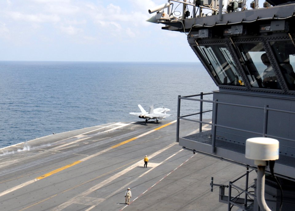 US Navy 100125-N-4236E-217 An F-A-18C Hornet assigned to the Rampagers of Strike Fighter Squadron (VFA) 131 catapults off the flight deck of the Nimitz-Class aircraft carrier USS Dwight D. Eisenhower (CVN 69)