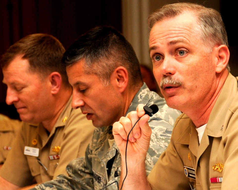 US Navy 100126-N-7498L-064 Capt. Rick Kitchens, commanding officer of Naval Station Pearl Harbor, answers a question during the Joint Base Pearl Harbor-Hickam open house