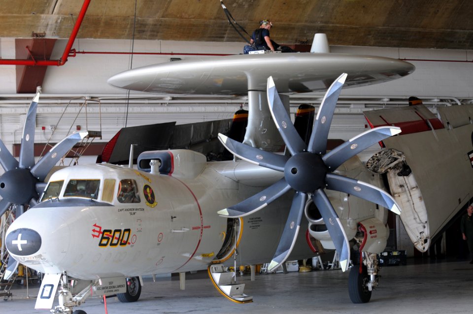 US Navy 100125-N-7456N-069 Petty Officer 1st Class Jason Edwards and Petty Officer 3rd Class Shah Mitesh conduct maintenance on the rotodome of an E-2C Hawkeye