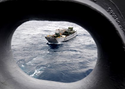 US Navy 100125-N-9950J-111 A landing craft utility vehicle assigned to Assault Craft Unit (ACU) 1 approaches the well deck of the forward-deployed amphibious assault ship USS Essex (LHD 2)
