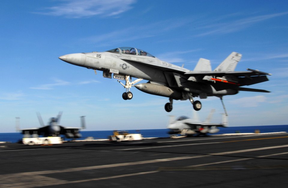 US Navy 100128-N-2858S-526 Super Hornet lands aboard USS Harry S. Truman