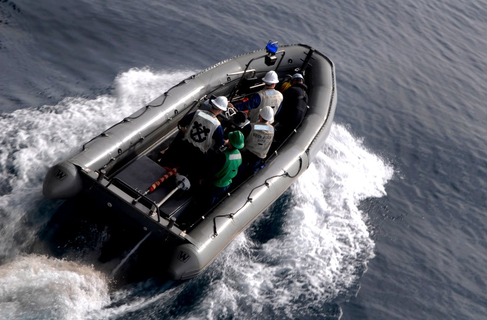 US Navy 100129-N-2475A-033 Sailors participate in a man overboard drill