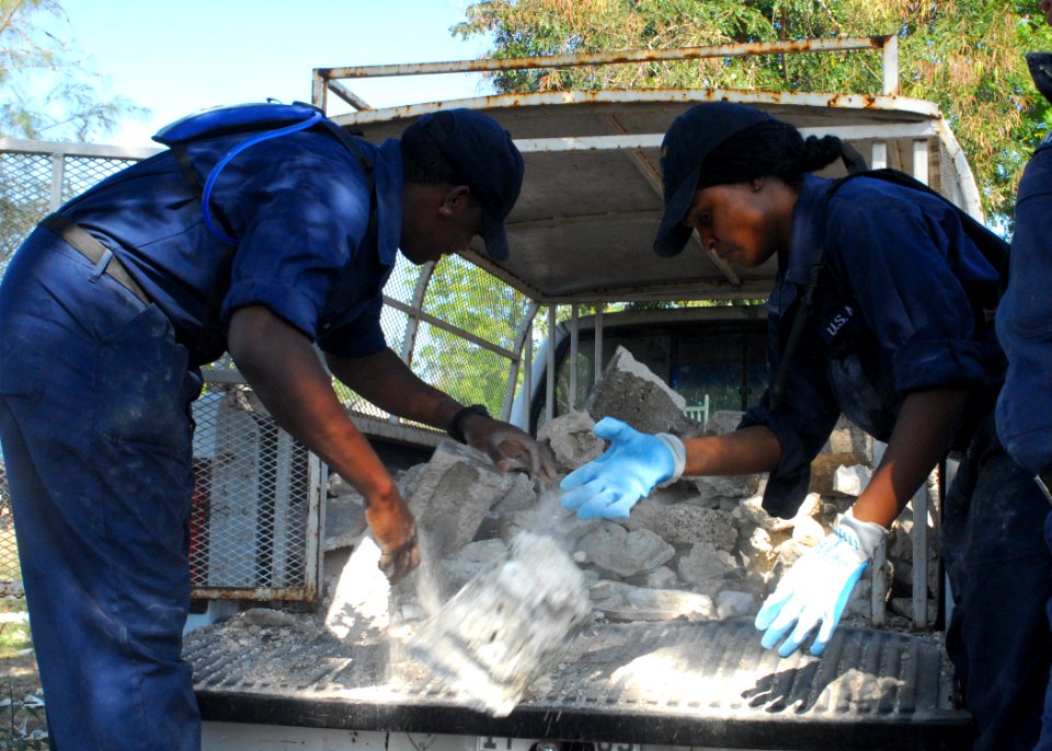 US Navy 100128-N-1092P-316 Sailors clear rubble in Grand Goave, Haiti