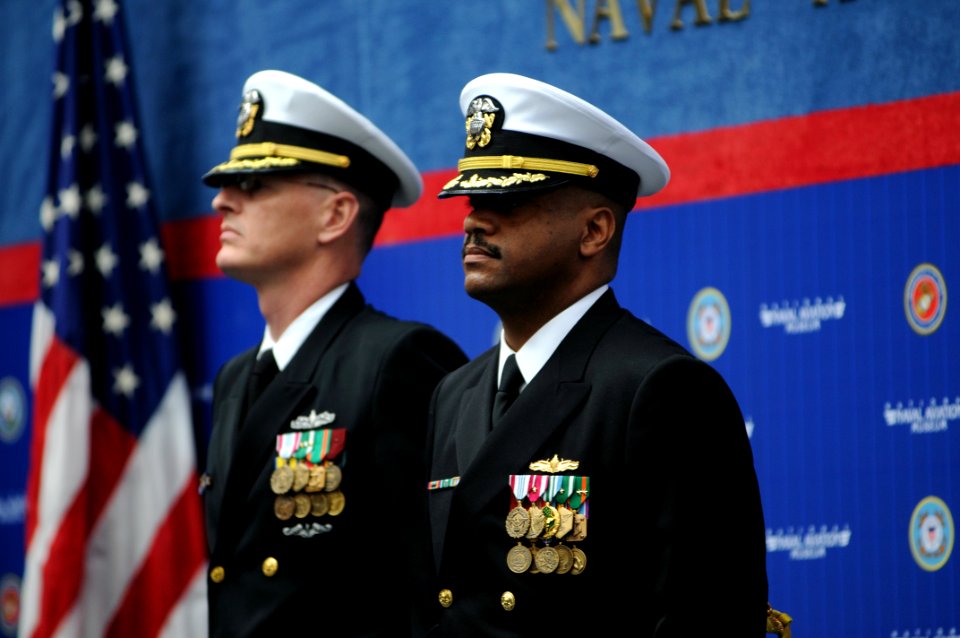 US Navy 100128-N-5328N-028 Cmdr. Evan A. Hipsley Jr. stands by to be officially relieved by Cmdr. Michael L. Douglas as officer in charge of the Center for Information Dominance Detachment Corry Station