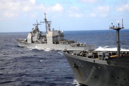 US Navy 100128-N-2735T-101 The guided-missile cruiser USS Normandy (CG 60) pulls away from the Military Sealift Command fleet replenishment oiler USNS Big Horn (T-AO 198) following an underway replenishment