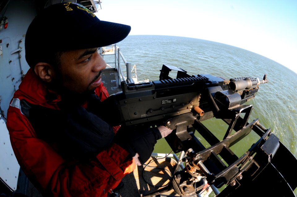US Navy 100128-N-7955L-166 Sailor stands watch aboard USS Kearsarge