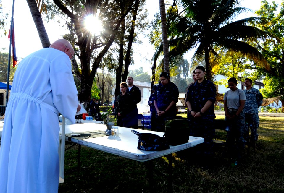 US Navy 100130-N-7948C-006 Service members attend a Catholic Mass at the Killick Haitian Coast Guard Base