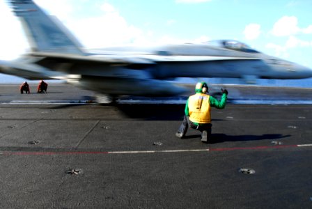 US Navy 100130-N-3327M-235 An F-A-18C Hornet assigned to the Warhawks of Strike Fighter Squadron (VFA) 97, launches from the aircraft carrier USS Nimitz (CVN 68)