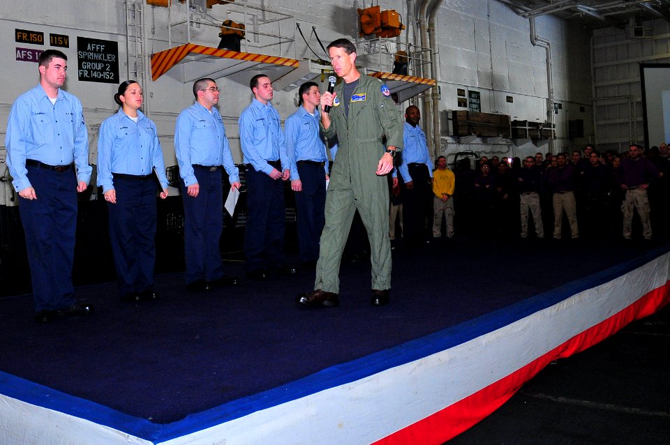 US Navy 100130-N-7939W-008 USS Nimitz commanding officer promotes Sailors