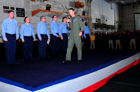 US Navy 100130-N-7939W-008 USS Nimitz commanding officer promotes Sailors