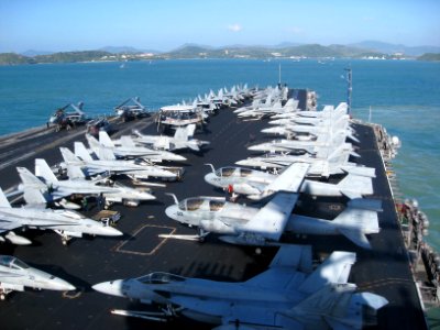 US Navy 100131-N-8421M-001 The aircraft carrier USS Nimitz (CVN 68) arrives at Phuket Thailand for a port visit