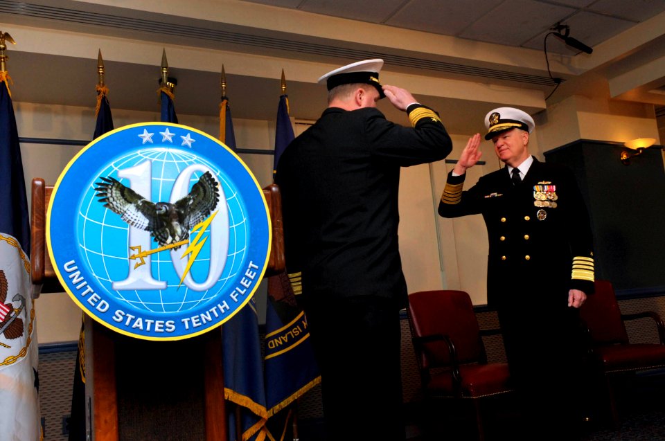 US Navy 100129-N-8273J-048 Chief of Naval Operations (CNO) Adm. Gary Roughead salutes Vice Adm. Barry McCullough, commander of U.S. Fleet Cyber Command and U.S. 10th Fleet at the commissioning ceremony for U.S. Fleet Cyber Comm