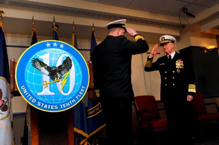 US Navy 100129-N-8273J-048 Chief of Naval Operations (CNO) Adm. Gary Roughead salutes Vice Adm. Barry McCullough, commander of U.S. Fleet Cyber Command and U.S. 10th Fleet at the commissioning ceremony for U.S. Fleet Cyber Comm