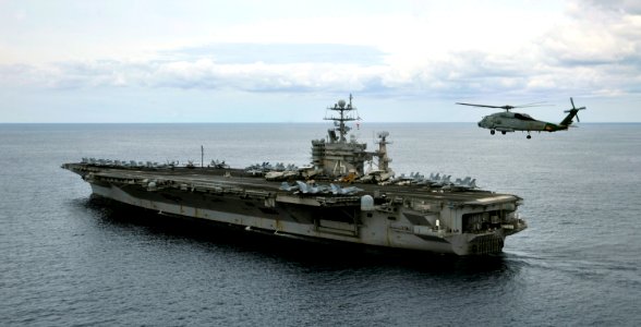 US Navy 100129-N-6003P-110 An SH-60F Sea Hawk helicopter assigned to the Dusty Dogs of Helicopter Anti-Submarine Squadron Seven (HS) 7 patrols the waterways around the Nimitz-class aircraft carrier USS Harry S. Truman (CVN 75)