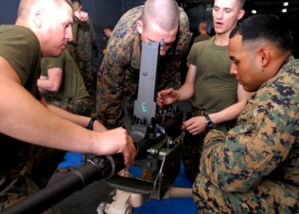 US Navy 100130-N-6692A-013 Marines train on a M-240B aboard USS Harpers Ferry