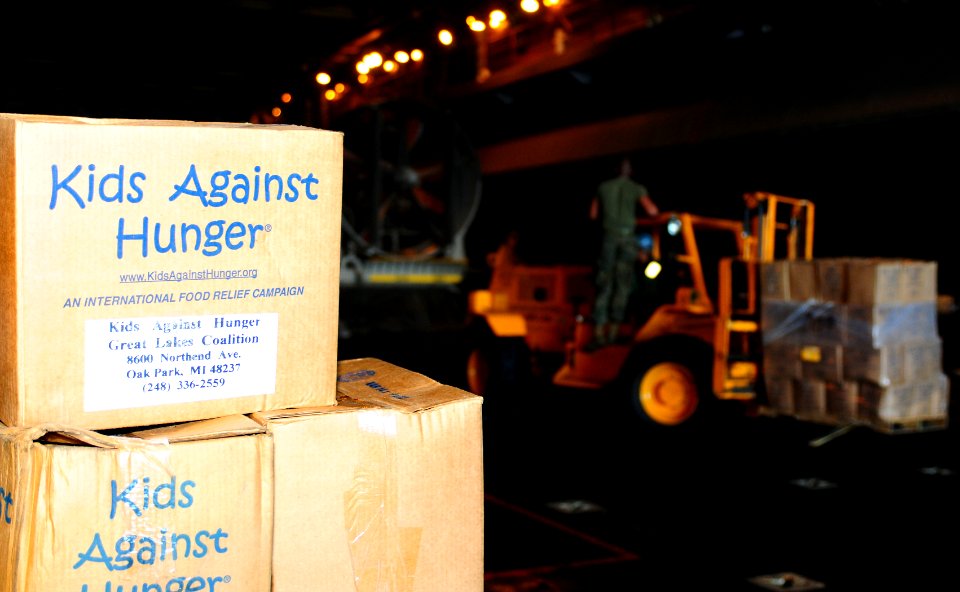 US Navy 100201-N-1831S-031 Sailors aboard the amphibious assault ship USS Bataan (LHD 5) prepare to load supplies onto Landing Craft Unit (LCU) 1663, assigned to Assault Craft Unit (ACU) 2